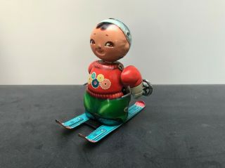 Vintage 1960 ' SKIING DOLL,  shopstock -,  made in China Shanghai,  tin toy 6
