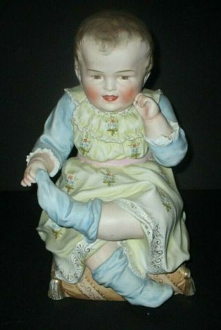 Antique Large Hertwig Piano Baby Bisque Porcelain Boy Pulling Sock Figure German