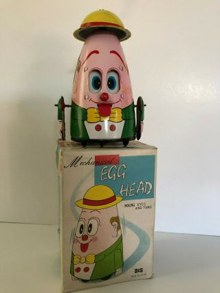 Japan Tin Mechanical Wind up EGG HEAD moving eyes and tang 2