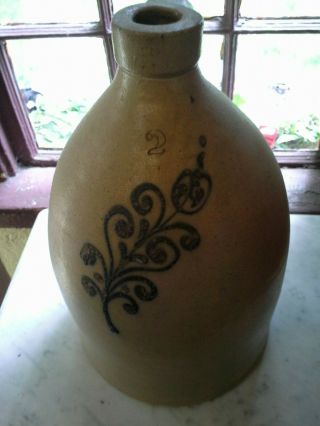 ANTIQUE TWO GALLON HANDLED STONEWARE JUG WITH THICK SLIP COBALT DESIGN 2