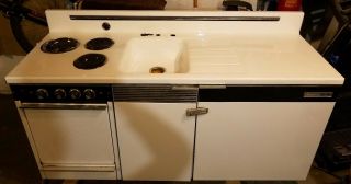 Kitchenette 6 ' wide.  Complete Kitchen.  Sink.  Stove top.  Oven.  Refrigerator. 2