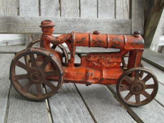 Early Cast Iron Tractor In Orange Paint