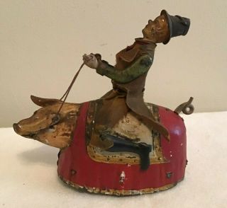Antique Lehmann German Wind - Up Movable Man On Pig Tin Toy