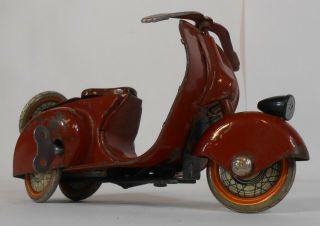Early Tin Wind - Up Motor Scooter.