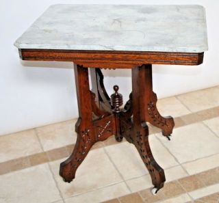 English Oak Victorian East Lake Faux Marble Top Carved Side End Table On Casters