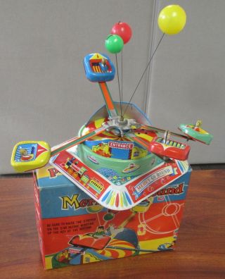 Vintage Alps Tin Litho Wind Up Mechanical Merry Go Round Toy W/orig Box