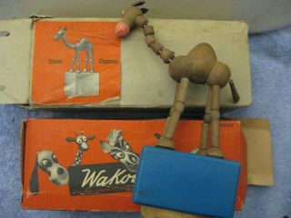 Swiss Black Forest Wood Carving Push Button Puppet Toy Camel Souvenir