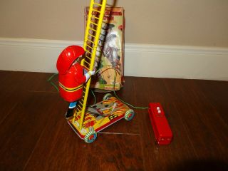 1950’s Ssk Walking & Climbing Fireman Remote Battery Operated.