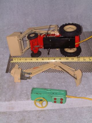VINTAGE CRAGSTAN,  TIN,  B/O 4040 DIESEL FORD TRACTOR W/BOX.  FULLY COOL 5