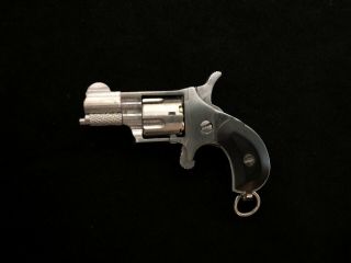 Miniature 2mm North American Arms style 1 : 2.  3 single action 5 shots revolver 3
