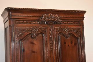 Two Door French Style Armoire Carved Basket With Flowers Dark Stained Pine 4