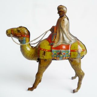 Vintage Tin Litho Wind up Wiseman on a Camel Made in Germany U.  S.  Zone RARE 3