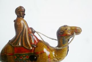 Vintage Tin Litho Wind up Wiseman on a Camel Made in Germany U.  S.  Zone RARE 4