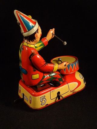 Vintage tin toy wind - up clown circus bump car drum HWN Nuremberg W.  Germany 1950s 3