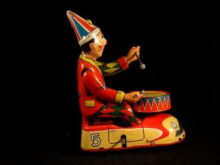 Vintage tin toy wind - up clown circus bump car drum HWN Nuremberg W.  Germany 1950s 8