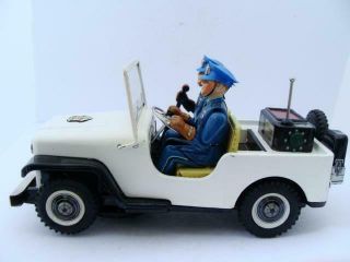 Nomura TN Police Patrol Jeep Battery Operated Tin Toy car boxed near 6