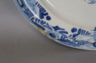 RARE EARLY 18TH C TIN GLAZE FAIENCE PLATE WITH VIBRANT BLUE FLORAL DECORATION 12