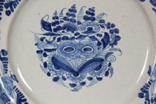RARE EARLY 18TH C TIN GLAZE FAIENCE PLATE WITH VIBRANT BLUE FLORAL DECORATION 4