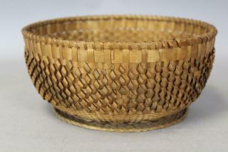 A VERY RARE 19TH C CENTER BASKET WITH RARE TUFFED ADDITIONS AND A DELICATE WEAVE 3