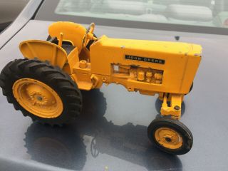 ANTIQUE or vintage CAST JOHN DEERE TRACTOR TOY 10