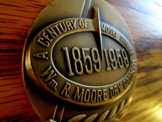 1859 - 1959 HUGE BRONZE PAPERWEIGHT 100TH ANNIVERSARY WM.  R.  MOORE DRY GOODS CO 2