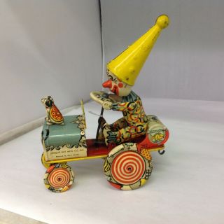 Vintage Unique Art Mfg.  Co.  Artie The Clown Tin Wind Up Toy Car.  610 - G