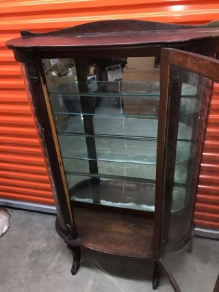 Round oak china cabinet - mirrored back with glass shelves from early 1900 ' s 2