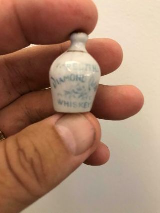 MEREDITH ' S DIAMOND CLUB WHISKEY.  EAST LIVERPOOL OHIO CHINA MINI JUG WATCH FOB 1 