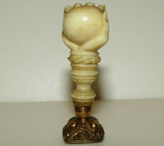 An Antique Georgian,  18th Century,  9 Ct Gold Ball In The Hand Fob Seal