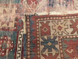 AN AUTHENTIC ANTIQUE HAND MADE CAUCASIAN TRIBAL RUG 12