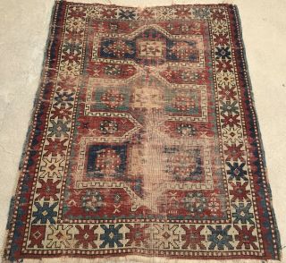 An Authentic Antique Hand Made Caucasian Tribal Rug