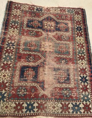 AN AUTHENTIC ANTIQUE HAND MADE CAUCASIAN TRIBAL RUG 2