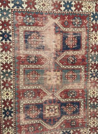 AN AUTHENTIC ANTIQUE HAND MADE CAUCASIAN TRIBAL RUG 3