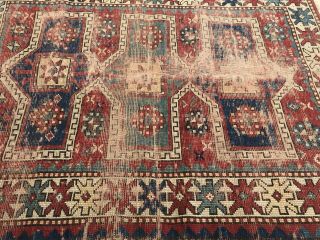 AN AUTHENTIC ANTIQUE HAND MADE CAUCASIAN TRIBAL RUG 4