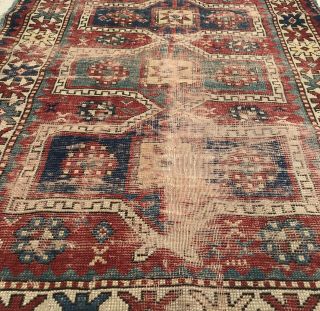 AN AUTHENTIC ANTIQUE HAND MADE CAUCASIAN TRIBAL RUG 5