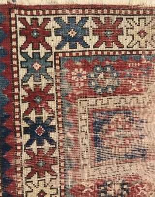 AN AUTHENTIC ANTIQUE HAND MADE CAUCASIAN TRIBAL RUG 6
