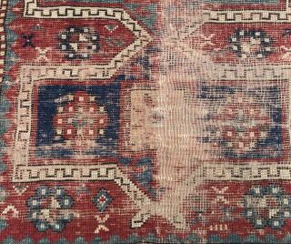 AN AUTHENTIC ANTIQUE HAND MADE CAUCASIAN TRIBAL RUG 9