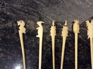 14 HAND CARVED BONE TOOTHPICKS/ COCKTAIL STICKS DEPICTING ANIMALS AND FLORA 2