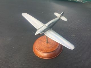 1945 ALUMINIUM SPITFIRE MODEL MOUNTED ON WOOD PLAQUE STAMPED RAF BY WHITEHEAD 2