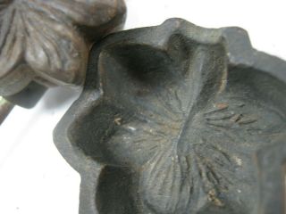THREE BRONZE FLOWER LEAF MOLDS,  MILLINERY IRONS,  UNMARKED,  A M T,  HABRANT 7