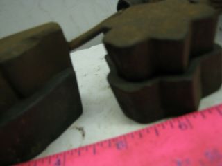THREE BRONZE FLOWER LEAF MOLDS,  MILLINERY IRONS,  UNMARKED,  A M T,  HABRANT 8