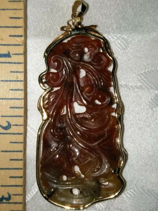 Brown Jade pendent,  carved on both sides,  encased in 14k gold 2