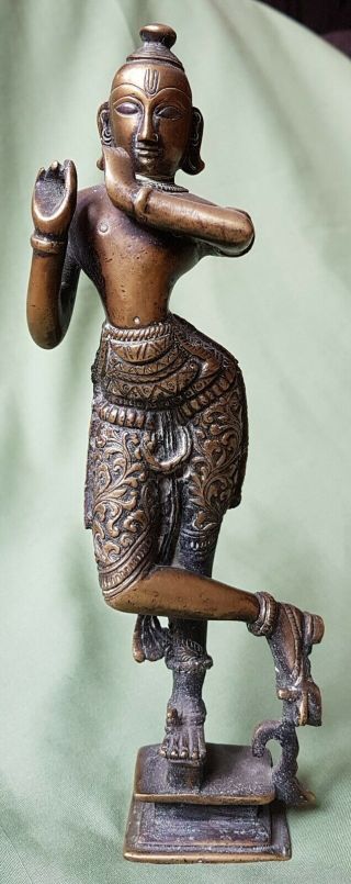 Large Brass Antique Statue Of A Figure Playing A Flute,  Silver Eyes
