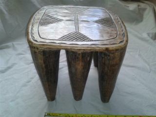 EARLY - MID 20TH C.  HEAVY CARVED WOOD AFRICAN SIX LEGGED STOOL. 2