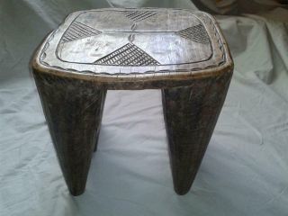 EARLY - MID 20TH C.  HEAVY CARVED WOOD AFRICAN SIX LEGGED STOOL. 3
