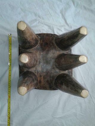 EARLY - MID 20TH C.  HEAVY CARVED WOOD AFRICAN SIX LEGGED STOOL. 5
