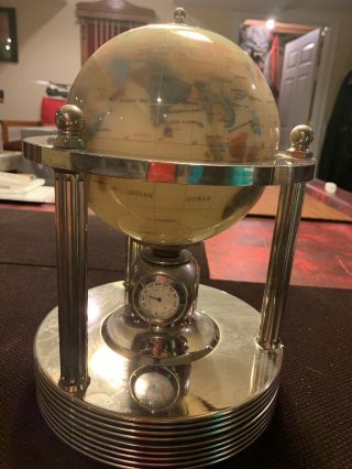 Mother of Pearl Gemstone Globe Rotating Clock.  Goldtone 2