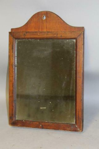 A GREAT AMERICAN COUNTRY QUEEN ANNE MIRROR WITH A TOMBSTONE CREST IN OLD SURFACE 2