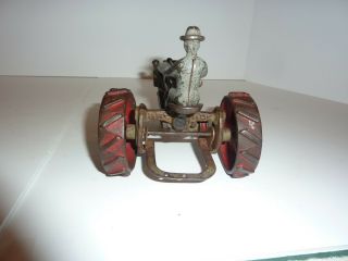 CAST IRON INTERATIONAL FARM TRACTOR.  ALL CAST IRON 6 - 1/2 INCH 6