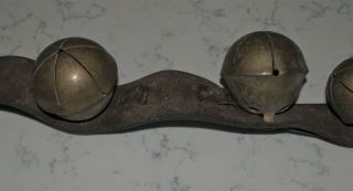ANTIQUE STRAND OF LARGE HORSE BRASS SLEIGH BELLS ON LEATHER STRAP 4